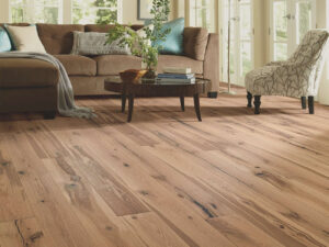 Warm tone hardwood floor refinished in a Central Alberta home
